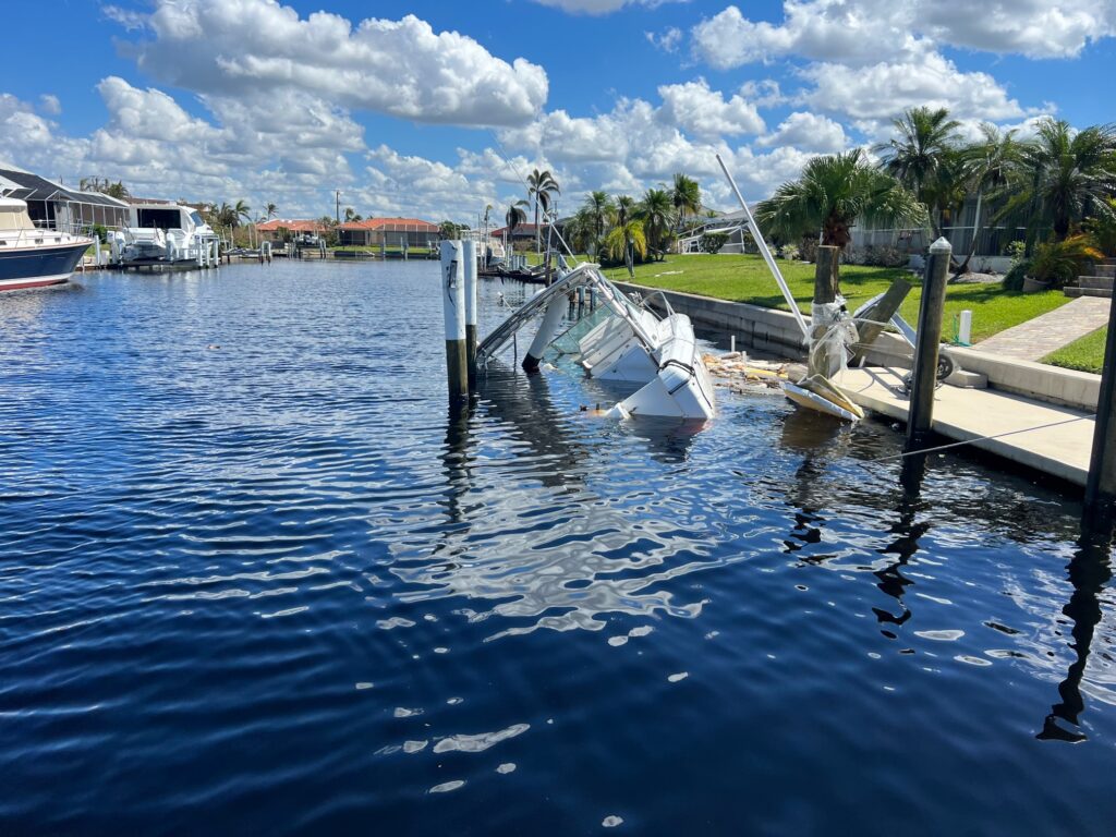 sunken boat dockside